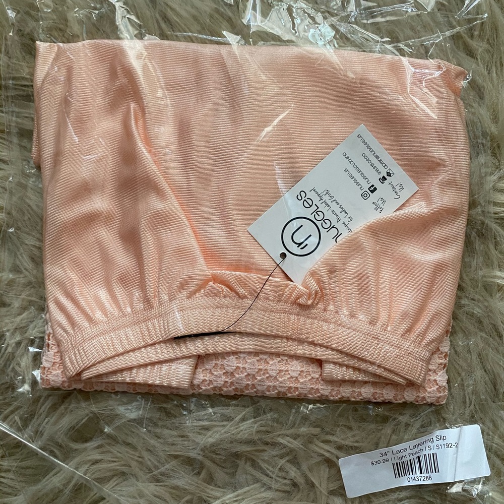 NWT📌 Nuggles Slip extender